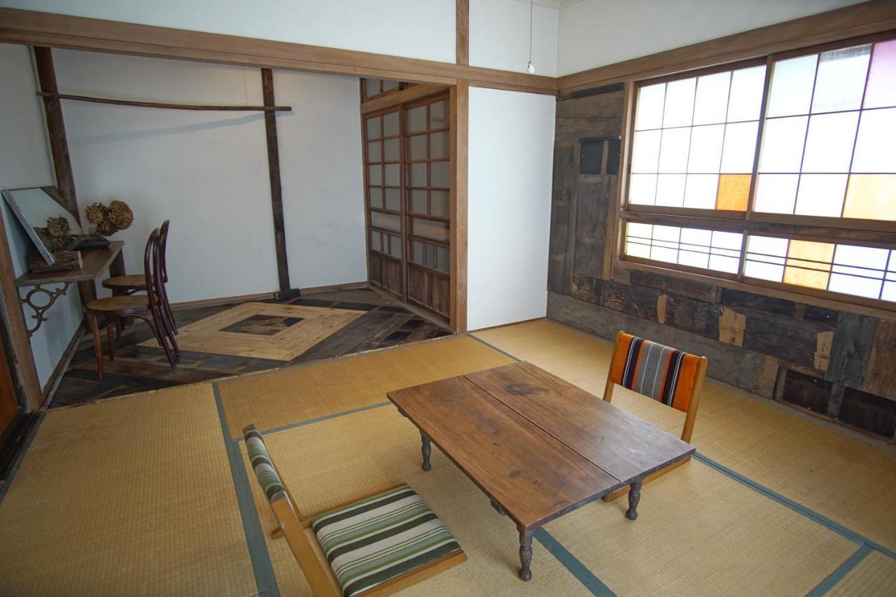 Hakuba Station Guesthouse En Buitenkant foto